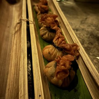 Restaurante Mezzanine - Money bags - Thai Near Me - Tulum, ROO