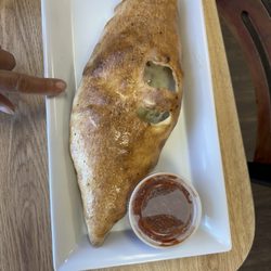 Pino's Pizza - We each had Stromboli. Mine the deluxe and this one vegetable lovers. Both were great. Large and really stuffed.
