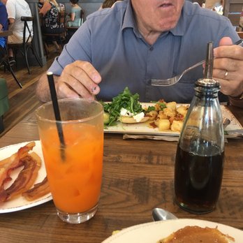 First Watch - Eggs Benedict, ricotta lemon pancakes with bacon. That drink was carrot orange coconut and lemon juice with turmeric. Coffee - Breakfast & Brunch Near Me - North Port, Florida First Watch - Eggs Benedict, ricotta lemon pancakes with bacon. That drink was carrot orange coconut and lemon juice with turmeric. Coffee - Breakfast & Brunch Near Me - North Port, Florida