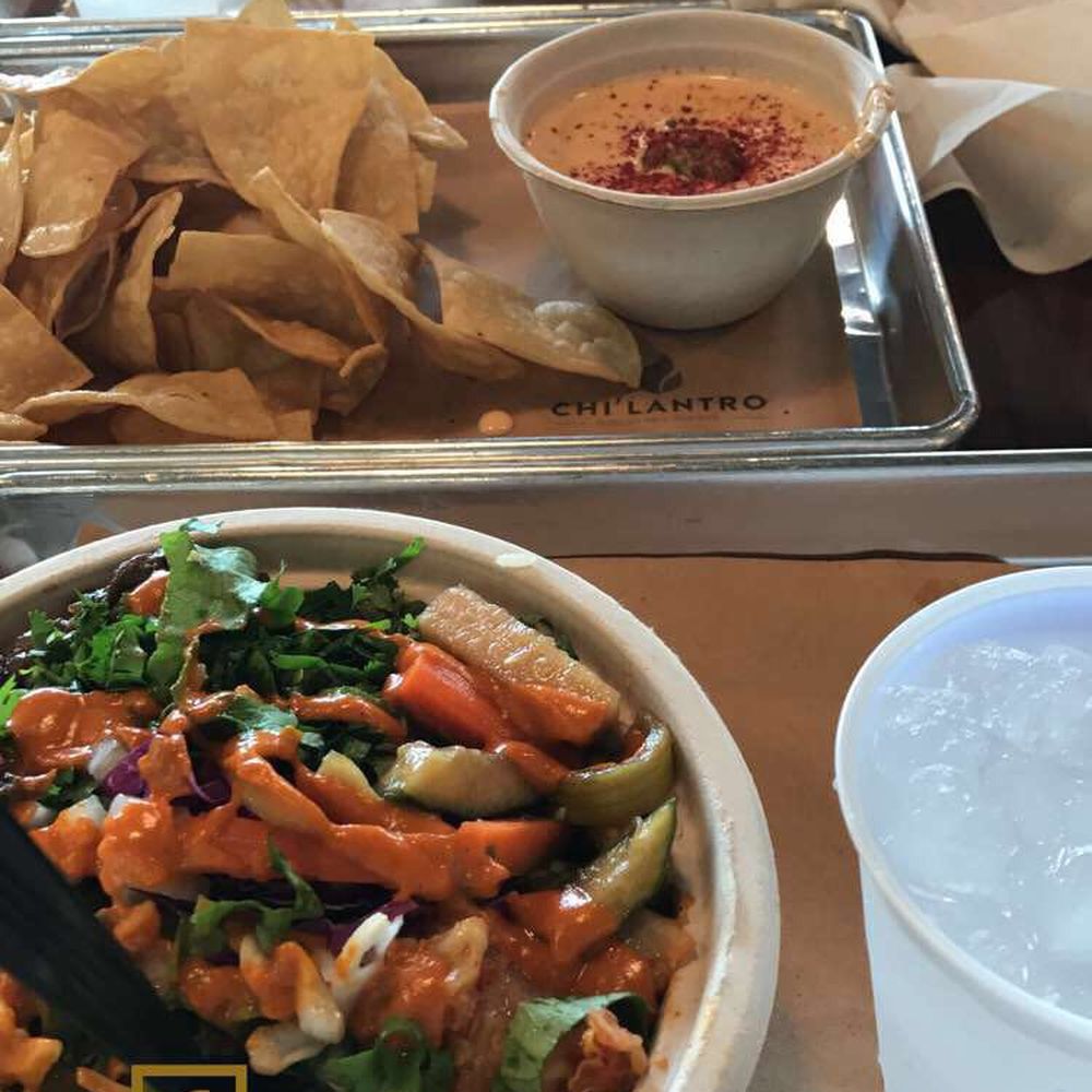 Chi'Lantro - Beef bowl, chips and queso, kimchi fries in the back - Korean Near Me - Austin, Texas Chi'Lantro - Beef bowl, chips and queso, kimchi fries in the back - Korean Near Me - Austin, Texas