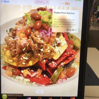 Novella - The menus photo and the second plate of nacho delivered to the table. I wish I took a photo of the first plate. - New American Near Me - Newark, New Jersey