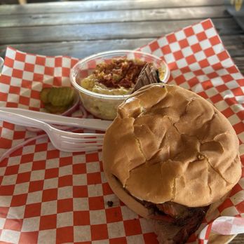 Dead End Trading Post - Sliced brisket sandwich with potato salad. - Desserts Near Me - Fort Worth, Texas Dead End Trading Post - Sliced brisket sandwich with potato salad. - Desserts Near Me - Fort Worth, Texas