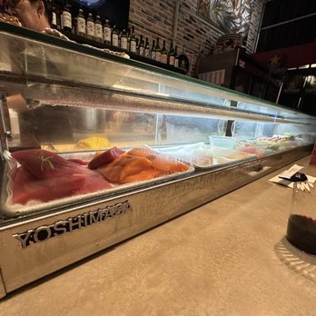 Sushi Song - a sushi bar filled with different types of sushi - Sushi Bars Near Me - Miami Beach, Florida