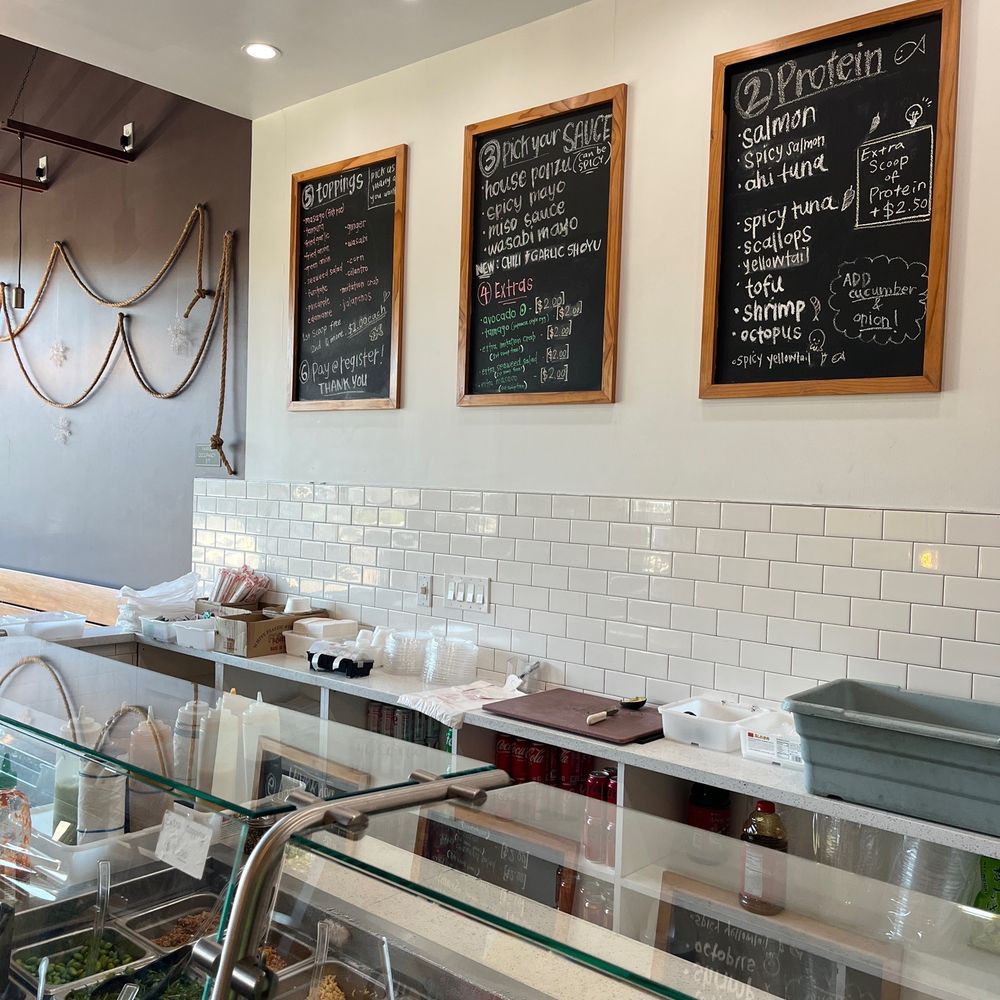 a view of a buffet with a variety of food items a view of a buffet with a variety of food items