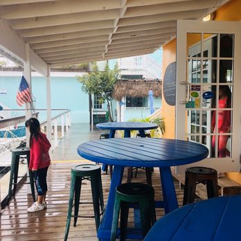 What The Fish Rolls - Outdoor patio seating deck - Seafood Near Me - Tavernier, Florida