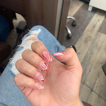 GiGi Lash & Nail - Red swirl nails. Almond shape - Eyelash Service Near Me - Centerville, Utah