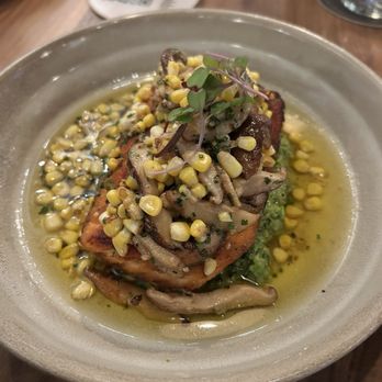 The Dead Rabbit - Salmon with pea mash and corn - Irish Pub Near Me - Austin, Texas The Dead Rabbit - Salmon with pea mash and corn - Irish Pub Near Me - Austin, Texas