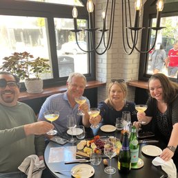 Enjoying a wonderful charcuterie board and drinks.