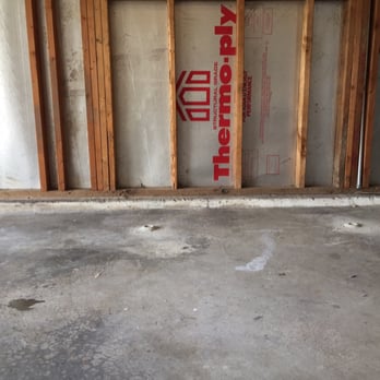 Superior Slabjacking - Before garage floor - General Contractors Near Me Superior Slabjacking - Before garage floor - General Contractors Near Me