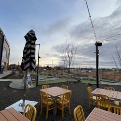 Outdoor seating with mini golf area