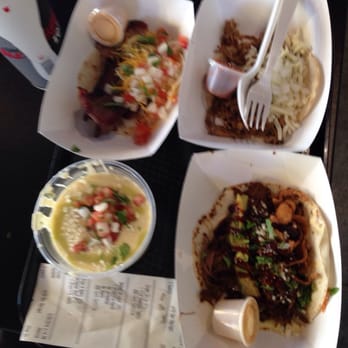 Voodoo Taco - Barbacoa, brisket, and carnitas with cheese sauce - Tex-Mex Near Me - Gretna, Nebraska Voodoo Taco - Barbacoa, brisket, and carnitas with cheese sauce - Tex-Mex Near Me - Gretna, Nebraska