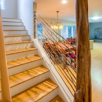Oliver Builders - This  recycled post from a fallen tree in Hawaii  Worked well as a structural post in this environmentally friendly addition - General Contractors Near Me - Berkeley, California
