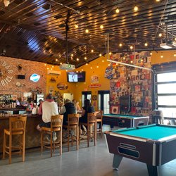 Crow Bar & Grill - Bar area. 2 pool tables. And 2 dart boards.
