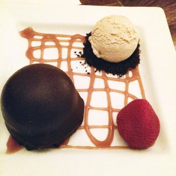 Malt - The Malt Chocolate Bomb. Why so many pictures of this? Because. It. Is. Delish. Beautiful. Light. Chocolate covered mousse. - New American Near Me - Newport, Rhode Island Malt - The Malt Chocolate Bomb. Why so many pictures of this? Because. It. Is. Delish. Beautiful. Light. Chocolate covered mousse. - New American Near Me - Newport, Rhode Island