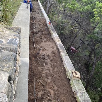 Angel's Landscaping - a man working on a retaining wall - Landscaping Near Me Angel's Landscaping - a man working on a retaining wall - Landscaping Near Me