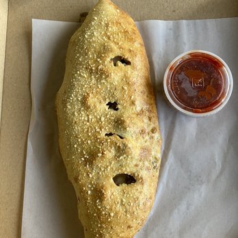 Mellow Mushroom - Sausagefest Calzone - Pizza Near Me - Huntsville, Alabama Mellow Mushroom - Sausagefest Calzone - Pizza Near Me - Huntsville, Alabama