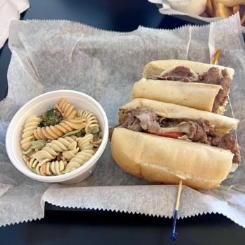 Jams Deli - Steak and Cheese Sandwich with Pasta Salad - Delis Near Me - Greensboro, North Carolina Jams Deli - Steak and Cheese Sandwich with Pasta Salad - Delis Near Me - Greensboro, North Carolina