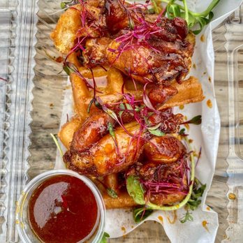 The Gourmet District - Smoked Hennessy N' Honey Glazed Wings on Fried Belgian Waffles - Food Trucks Near Me - Oxnard, California The Gourmet District - Smoked Hennessy N' Honey Glazed Wings on Fried Belgian Waffles - Food Trucks Near Me - Oxnard, California