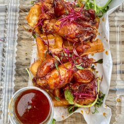 The Gourmet District - Smoked Hennessy N' Honey Glazed Wings on Fried Belgian Waffles