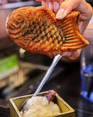 Kura Revolving Sushi Bar by null