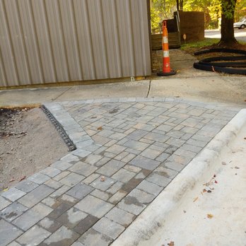 Grand Design - a paved walkway with a fire hydrant - Landscaping Near Me - Raleigh, North Carolina Grand Design - a paved walkway with a fire hydrant - Landscaping Near Me - Raleigh, North Carolina