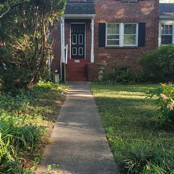 Easy Fast Clean - a sidewalk leading to a house - Snow Removal Near Me