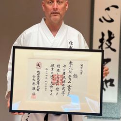 Lonsdale Karate - Tim with 8th Dan Certificate.