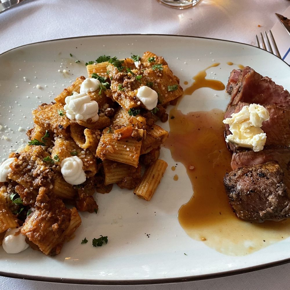Parc - Bolognese rigatoni with a side of steak. It was supposed to be steak with a side of pasta. But, I got a tiny portion...not 6 ounces. - New American Near Me - Detroit, Michigan Parc - Bolognese rigatoni with a side of steak. It was supposed to be steak with a side of pasta. But, I got a tiny portion...not 6 ounces. - New American Near Me - Detroit, Michigan