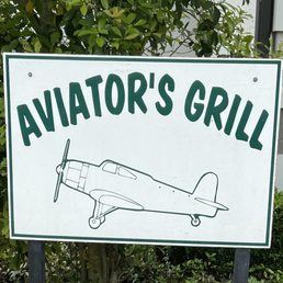 an airplane drawn on a sign