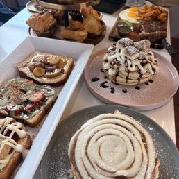French toast flight, cinnamon roll pancakes, s'mores pancakes, two tier tray, the carnivore French toast flight, cinnamon roll pancakes, s'mores pancakes, two tier tray, the carnivore