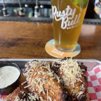 Rusty Bull Downtown Charleston - Garlic Parm Wings and Saltwater Cerveza - American Near Me - Charleston, South Carolina Rusty Bull Downtown Charleston - Garlic Parm Wings and Saltwater Cerveza - American Near Me - Charleston, South Carolina