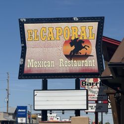 El Caporal Mexican Restaurant - Sign and Rat that we found during our dinning.