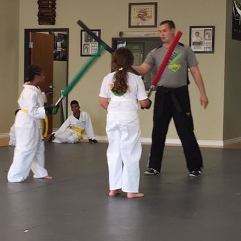 Premier Martial Arts Plano - Playing a fun game at the end of class - Party & Event Planning Near Me - Plano, Texas Premier Martial Arts Plano - Playing a fun game at the end of class - Party & Event Planning Near Me - Plano, Texas