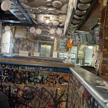 Steel Wheels Pizzeria - a man sitting at the bar - Pizza Near Me - Edmonton, Alberta Steel Wheels Pizzeria - a man sitting at the bar - Pizza Near Me - Edmonton, Alberta