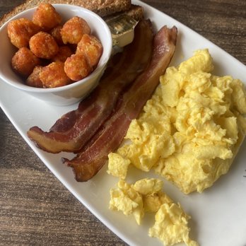 Tryst Cafe - Tryst Breakfast with scrambled eggs, bacon, sweet potato tots and wheat toast. - Breakfast & Brunch Near Me - Chandler, Arizona