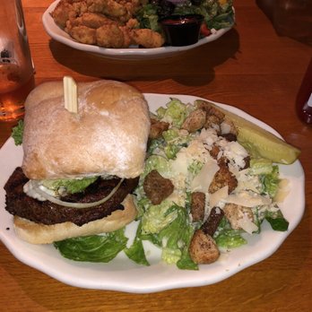 Thirsty Whale - Blackened Blue Cheese Burger with caesar salad on the side - American Near Me - Bar Harbor, Maine Thirsty Whale - Blackened Blue Cheese Burger with caesar salad on the side - American Near Me - Bar Harbor, Maine