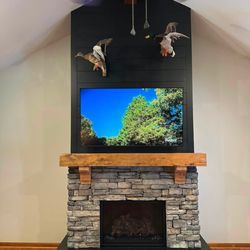 Chimney Pro - Added a new fireplace to existing home, framing, stone, shiplap, FireplaceX gas fireplace.