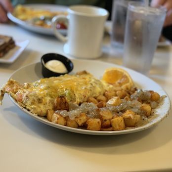 The Poked Yolk - Santa Fa Omlette with Onions on my potatoes. - Diners Near Me - Buffalo, New York The Poked Yolk - Santa Fa Omlette with Onions on my potatoes. - Diners Near Me - Buffalo, New York