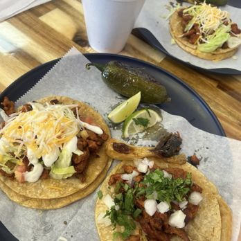 Joanna La Michoacana - Pork tacos on corn. One American style and one Mexican style. Also a small elote - Ice Cream & Frozen Yogurt Near Me - Benton Harbor, Michigan