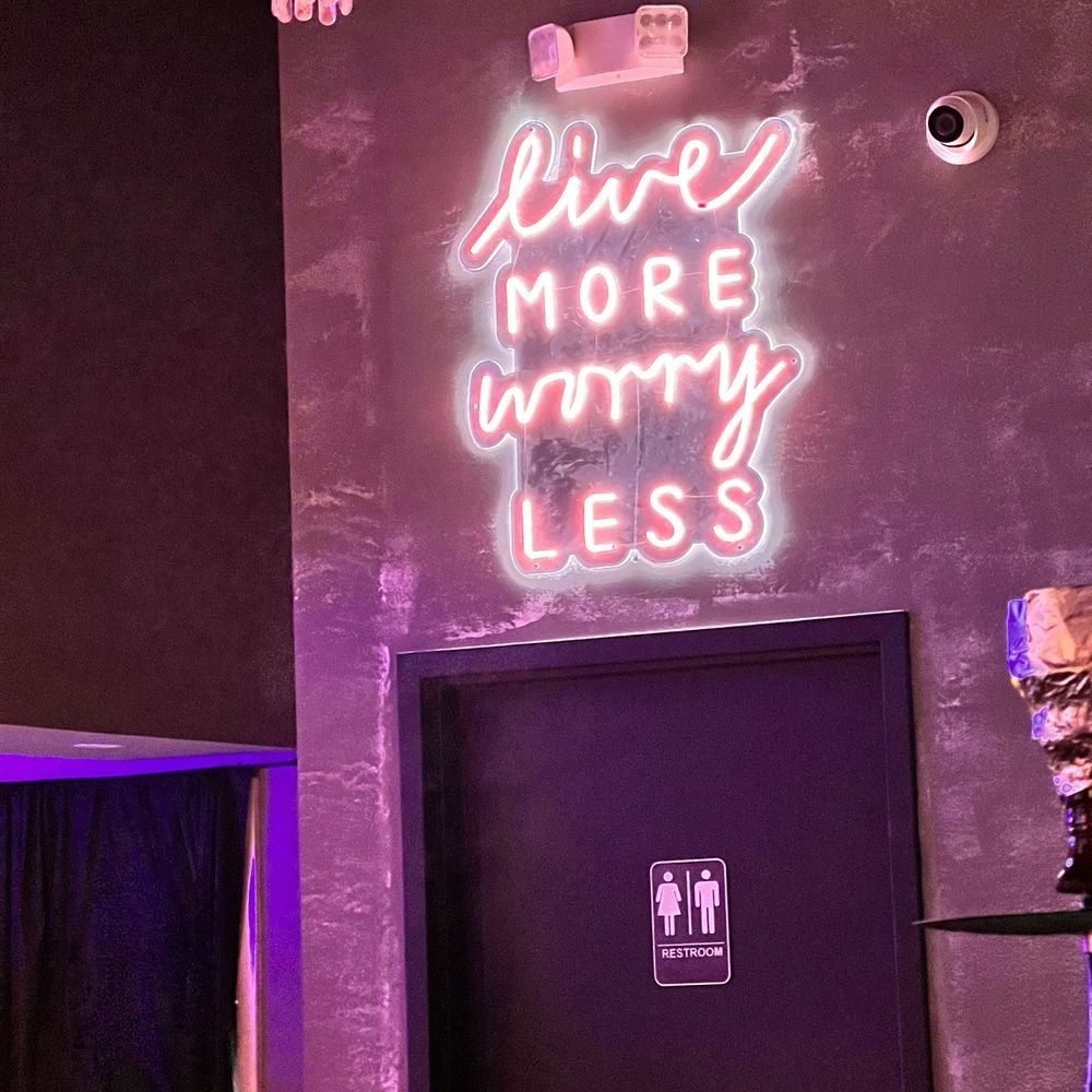 Maya Lounge - No spot is complete without the neon inspirational sign - Lounges Near Me - Houston, Texas