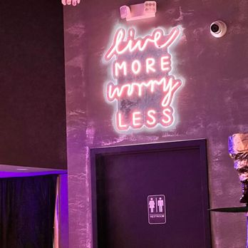 Maya Lounge - No spot is complete without the neon inspirational sign - Lounges Near Me - Houston, Texas