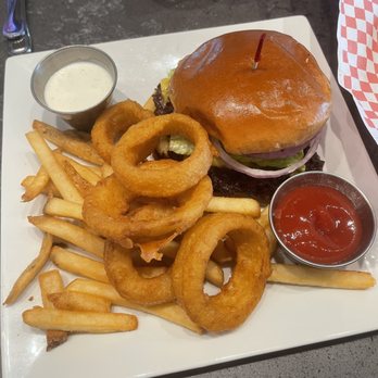 Nevada Brew Works - Classic Cheeseburger with shared onion rings from a friend's meal - Brewpubs Near Me - Las Vegas, Nevada Nevada Brew Works - Classic Cheeseburger with shared onion rings from a friend's meal - Brewpubs Near Me - Las Vegas, Nevada