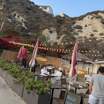 The Sunset Restaurant - Outdoor patio on sand - New American Near Me - Malibu, California