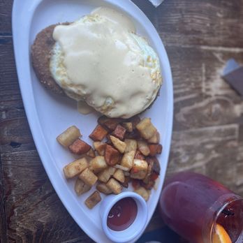 The District - Crabcake Benedict. Replaced poached eggs with fried eggs. - American Near Me - Providence, Rhode Island