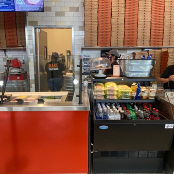 Blaze Pizza - The front of the restaurant at the airport. - Pizza Near Me - Houston, Texas