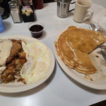 Marcia's Silver Spoon Cafe - Chicken Fried Steak & Eggs with the "loaded" hash browns (Bomb.com hashbrowns) and a buttermilk pancake. - Breakfast & Brunch Near Me - Tacoma, Washington Marcia's Silver Spoon Cafe - Chicken Fried Steak & Eggs with the "loaded" hash browns (Bomb.com hashbrowns) and a buttermilk pancake. - Breakfast & Brunch Near Me - Tacoma, Washington