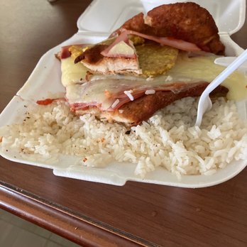 Old Cuban Cafe - a plate of food with rice and meat - Cuban Near Me - Orlando, Florida Old Cuban Cafe - a plate of food with rice and meat - Cuban Near Me - Orlando, Florida