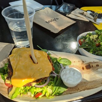 Frida's - Frieda's restaurant - patio seating. Black bean burgers no bun, kale salad. - Vegetarian Near Me - University City, Missouri Frida's - Frieda's restaurant - patio seating. Black bean burgers no bun, kale salad. - Vegetarian Near Me - University City, Missouri
