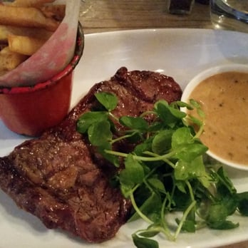 Bill's - Rib eye streak, fries and peppercorn sauce. - British Near Me - Oxford, OXF Bill's - Rib eye streak, fries and peppercorn sauce. - British Near Me - Oxford, OXF