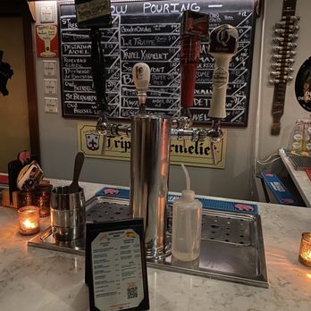 Mort Subite - The chalkboard provides dozens of Belgium beers and glassware options - Pubs Near Me - Austin, Texas